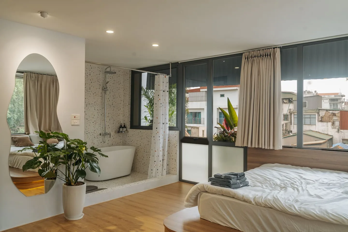 Bedroom 3 with a hot tub next to the window