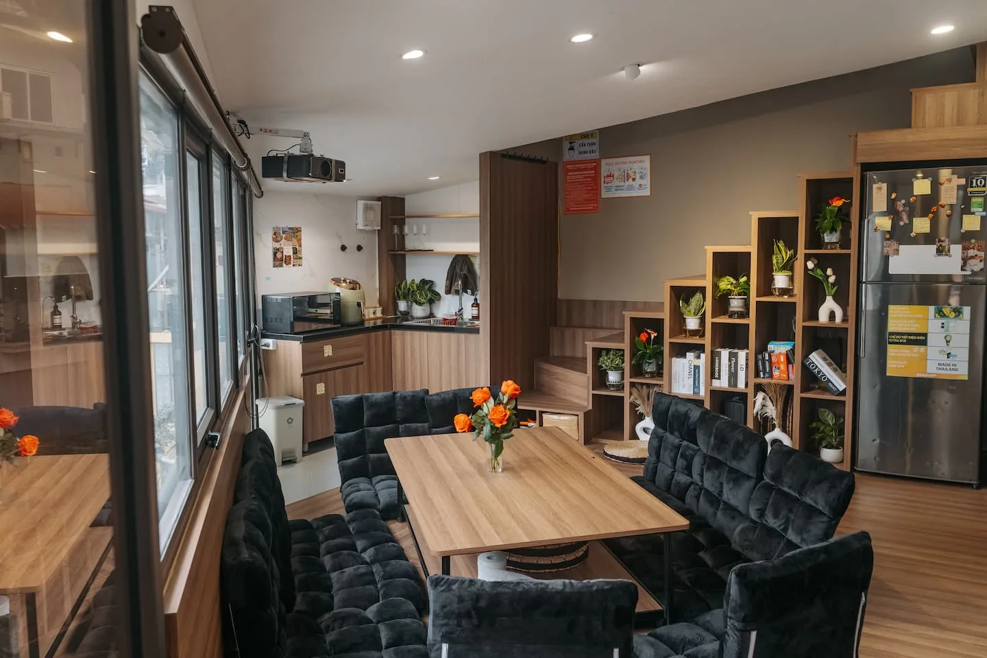 Shared kitchen and dining table for 10–12 guests