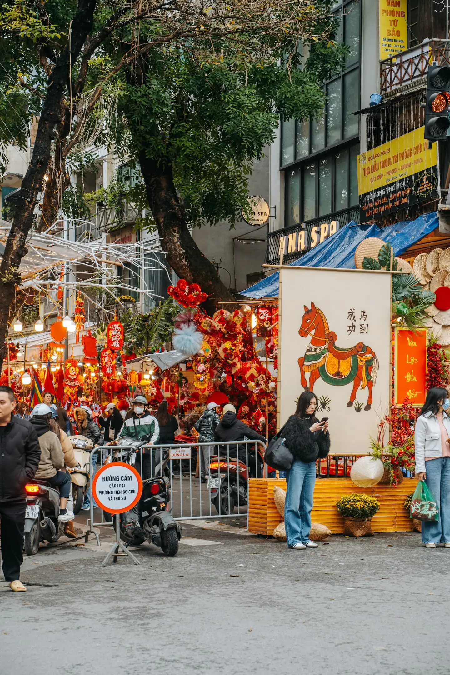 Hang Ma Street glowing with lanterns, seen from the HomieStay balcony